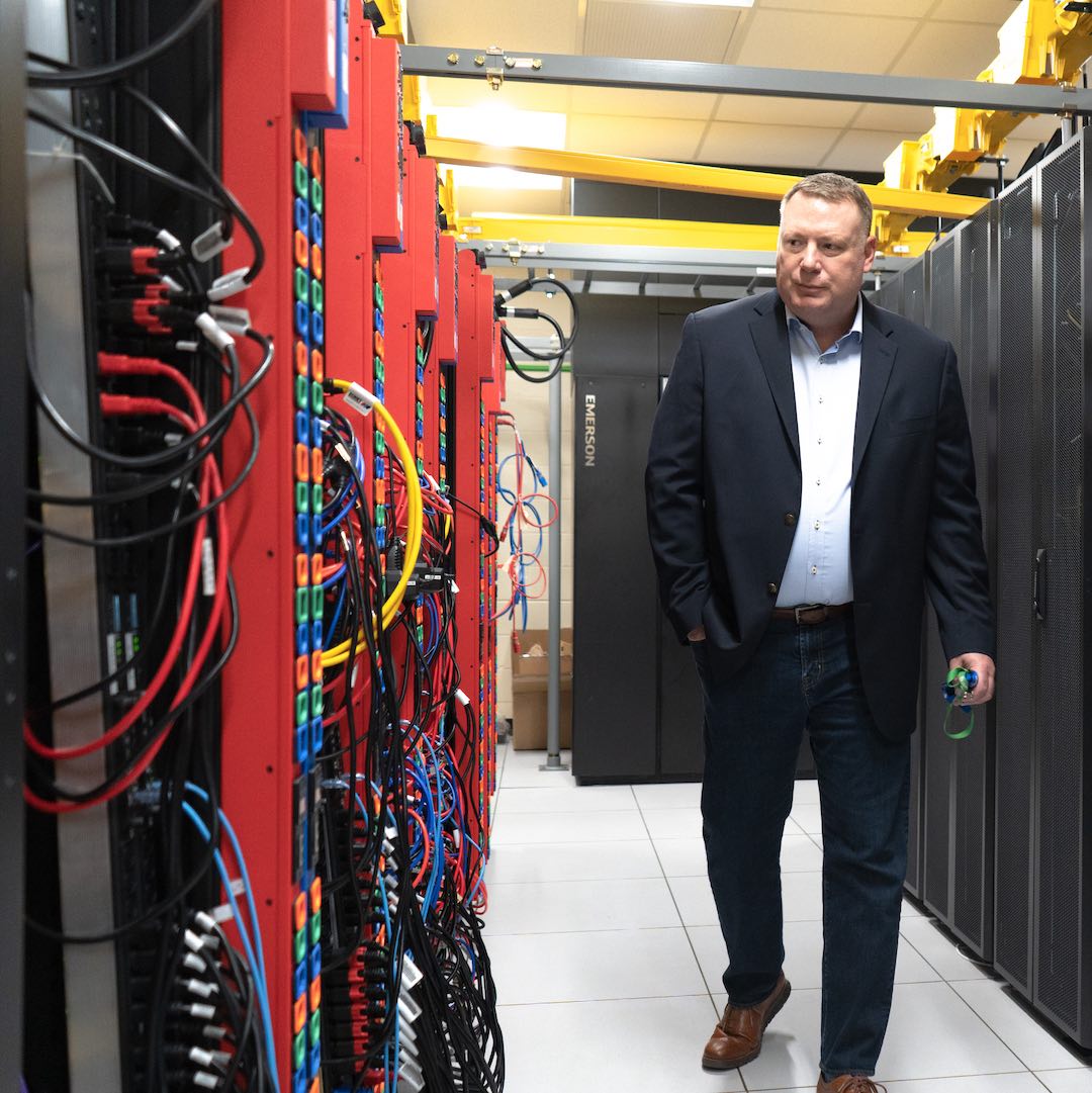 Man walking through OzarksGo data center